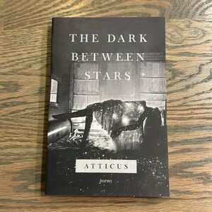 Almost New! The Dark Between Stars by Atticus